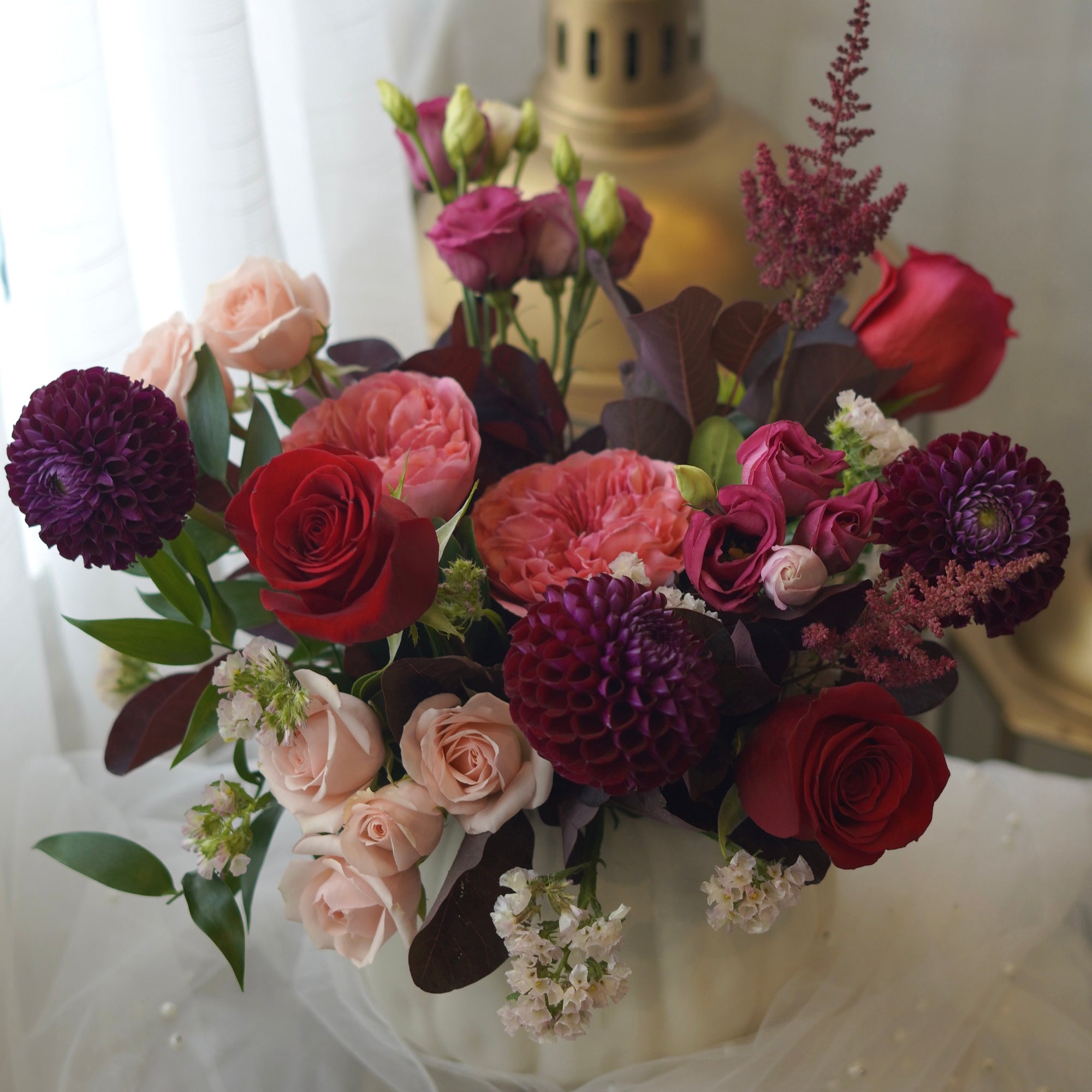 Velvet Romance burgundy and blush dahlia arrangement in cream vase — Toronto same-day flower delivery