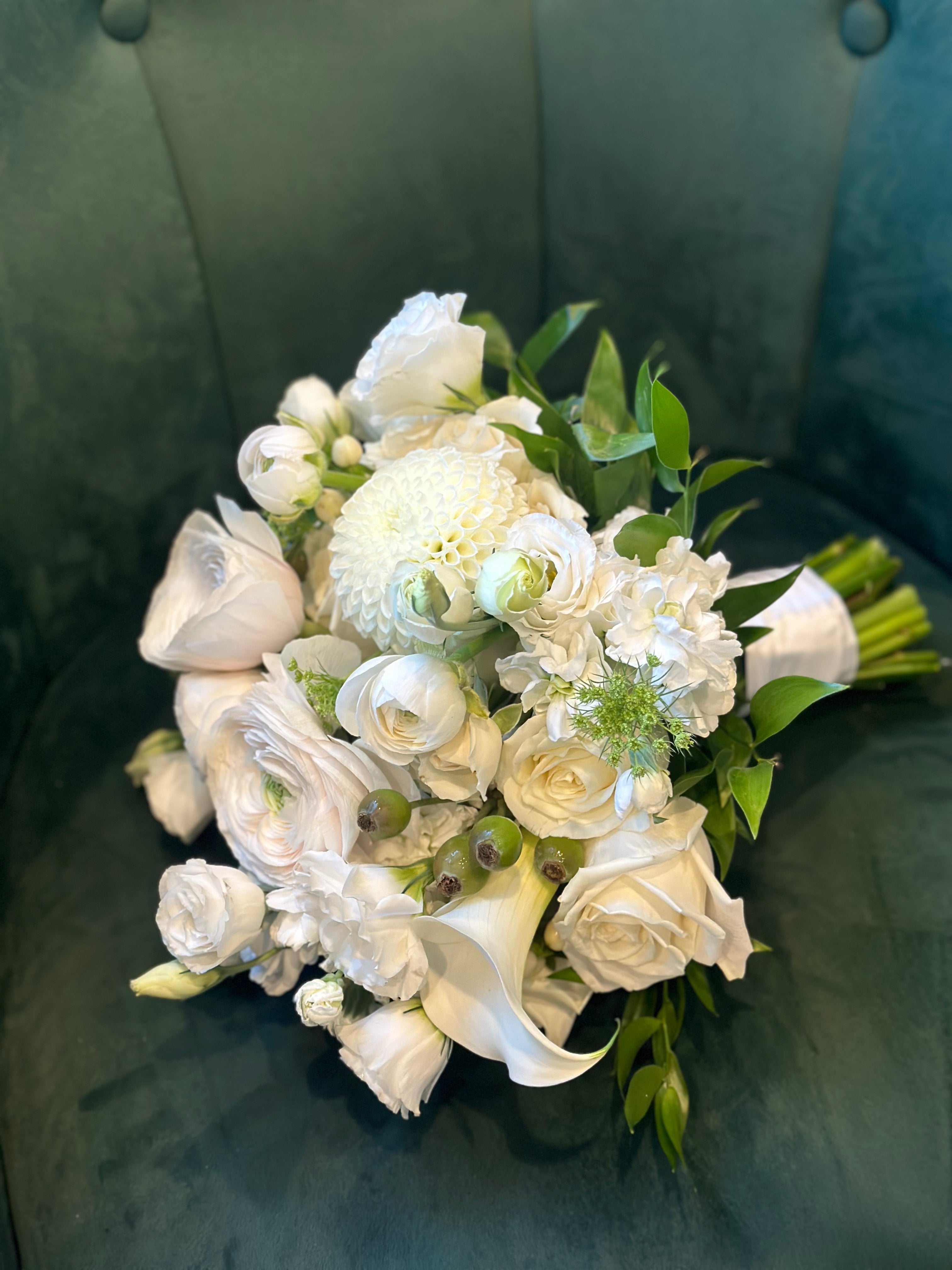 luxury all white bridal bouquet soft romantic wedding flowers close up