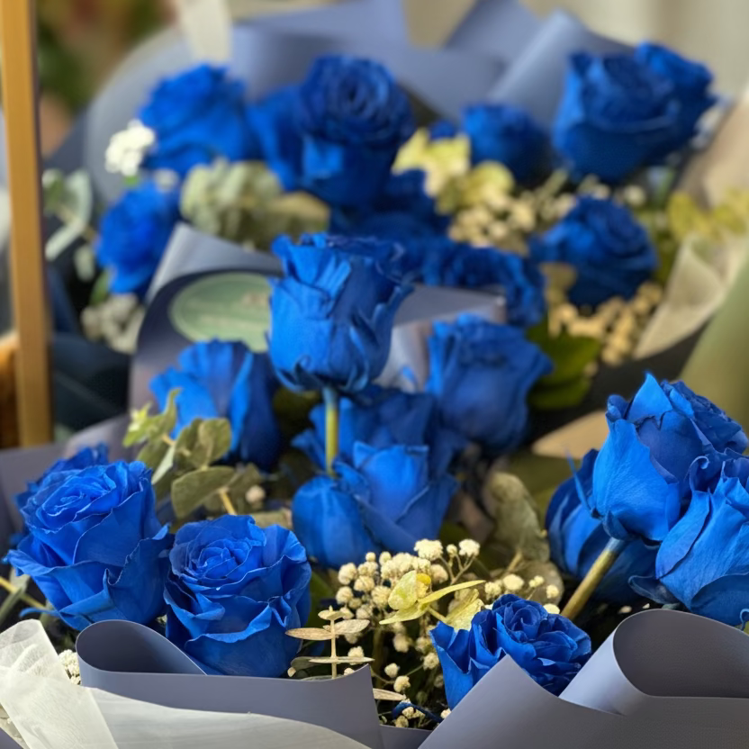 Classic blue rose bouquet styled as a gift for a special day