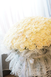 100 white roses round bouquet made with premium Playa Blanca roses