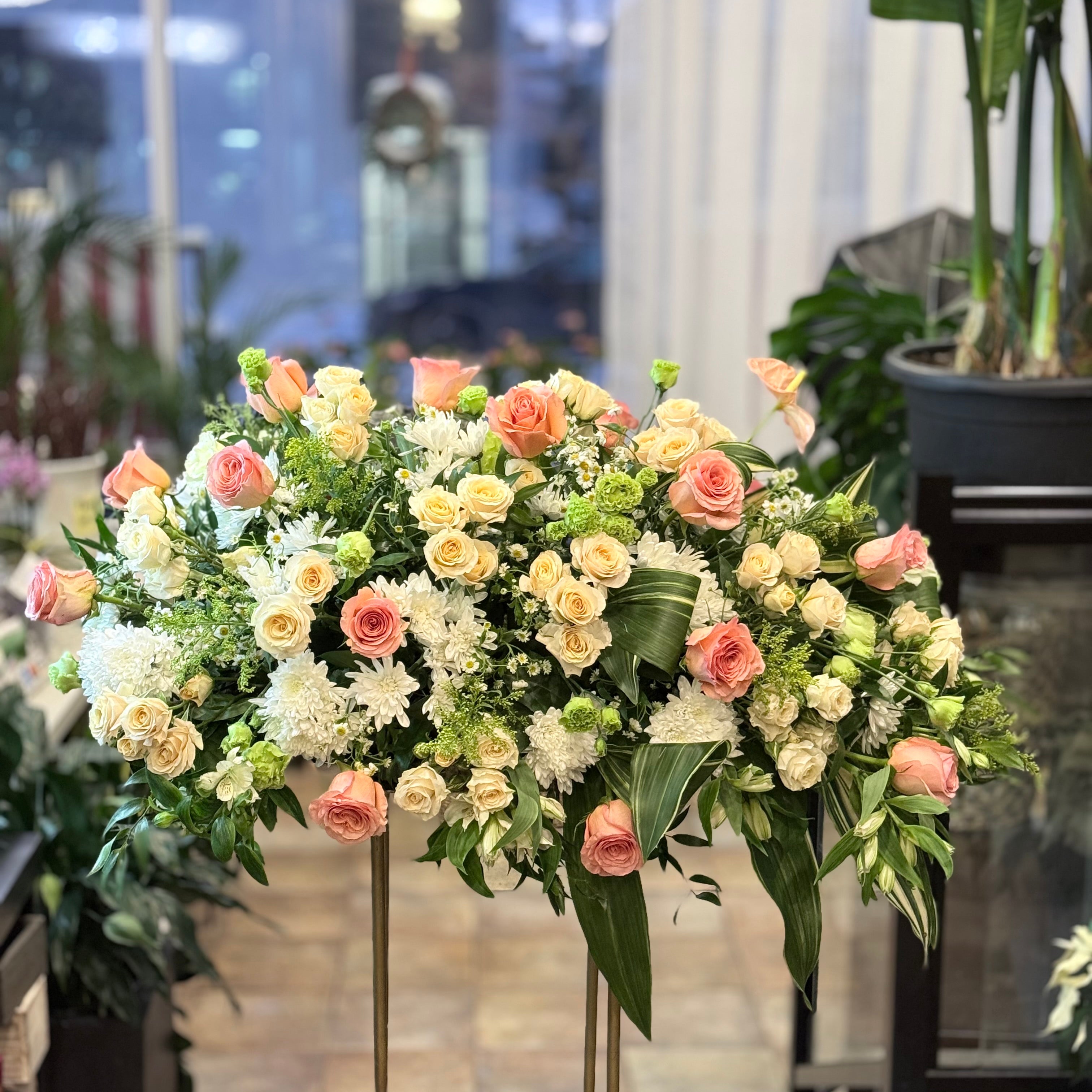 A front-facing photo that is clearly visible from the front when placed on the casket.casket spray,Funeral & Sympathy Flowers Toronto