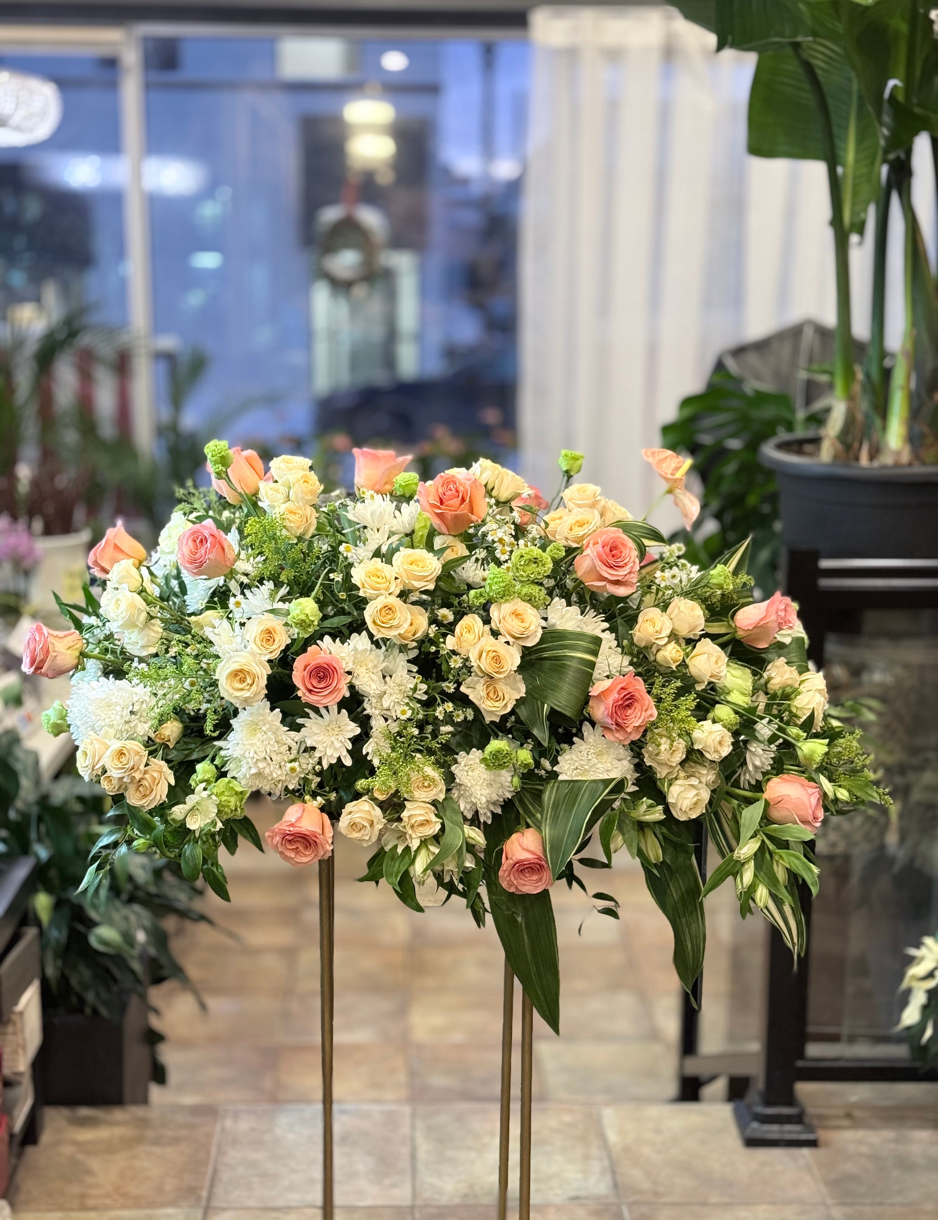 A front-facing photo that is clearly visible from the front when placed on the casket.casket spray,Funeral & Sympathy Flowers Toronto