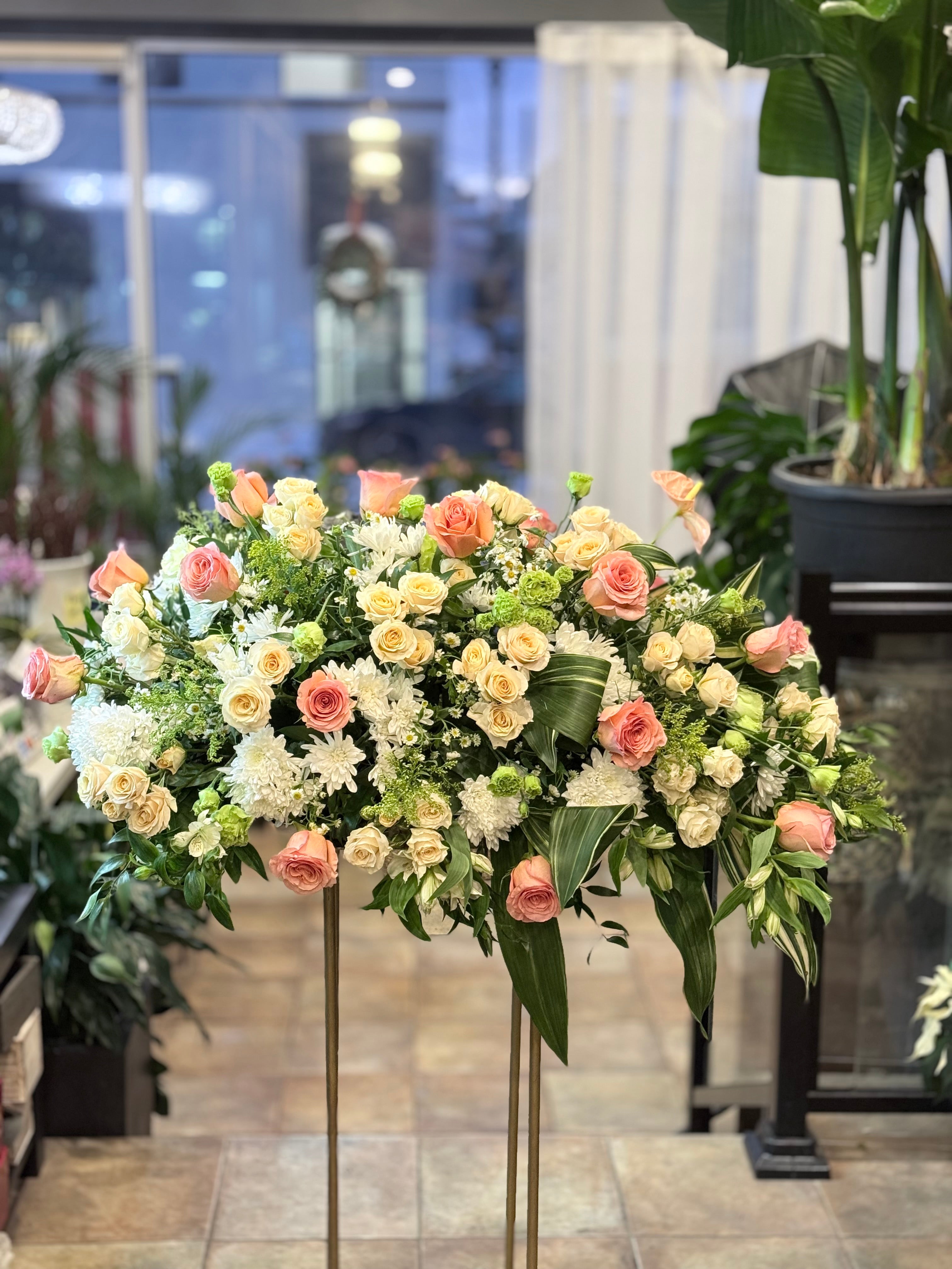A front-facing photo that is clearly visible from the front when placed on the casket.casket spray,Funeral & Sympathy Flowers Toronto