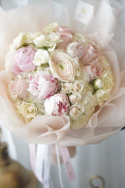 Luxury blush pink peony bouquet with roses and ranunculus by Moon’s Flowers