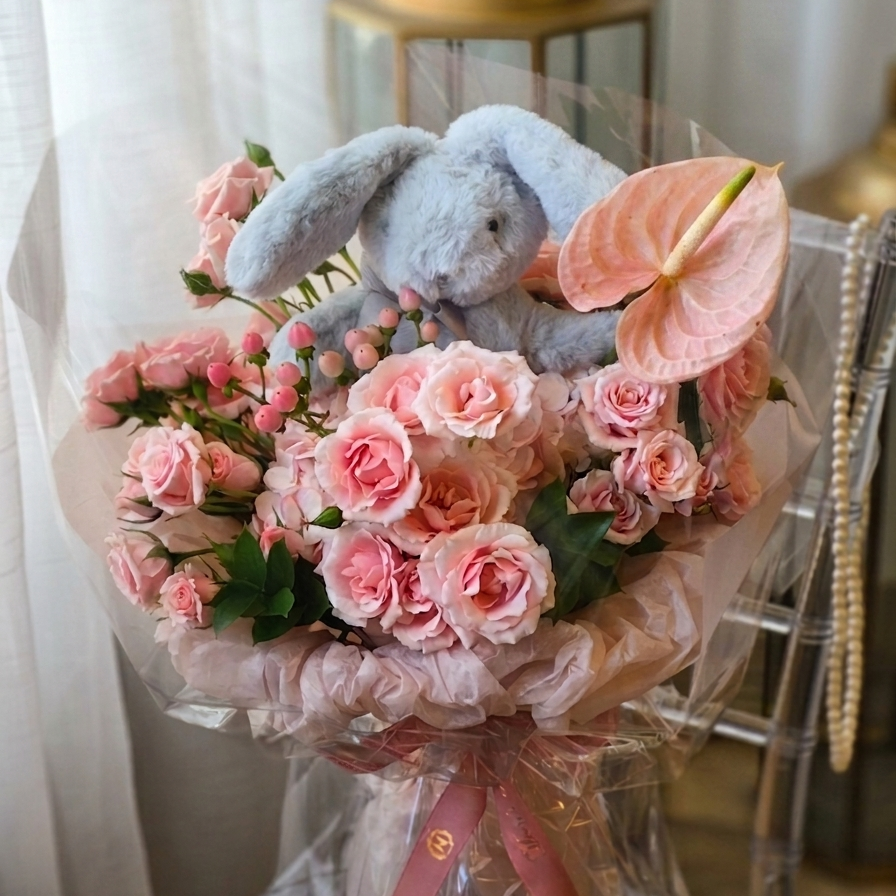     Luxury pink bunny flower bouquet with blush roses and pink anthurium by Moon’s Flowers