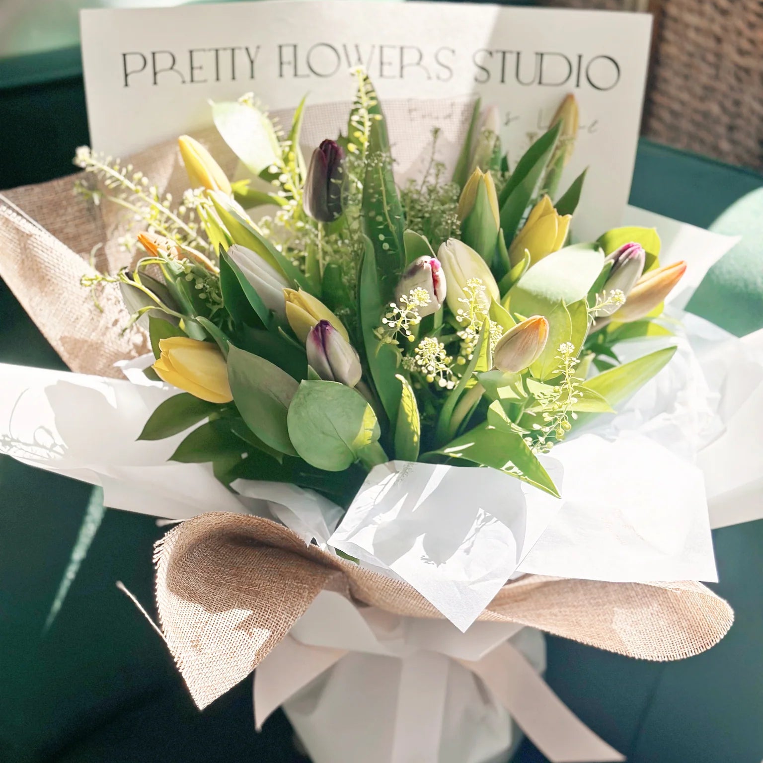 Fresh cut tulip arrangement in various colors, perfect Mother's Day gift for same-day delivery in Toronto.