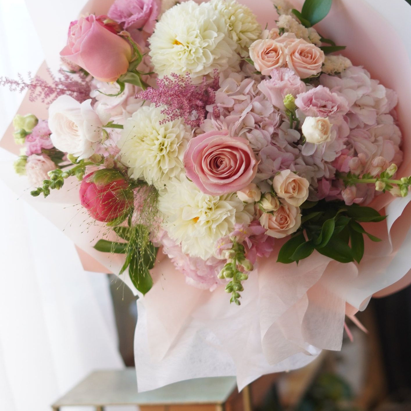 Pink Day Bouquet with roses and ranunculus, available for same-day flower delivery in Oakville, Toronto, and the GTA by Moon's Flowers