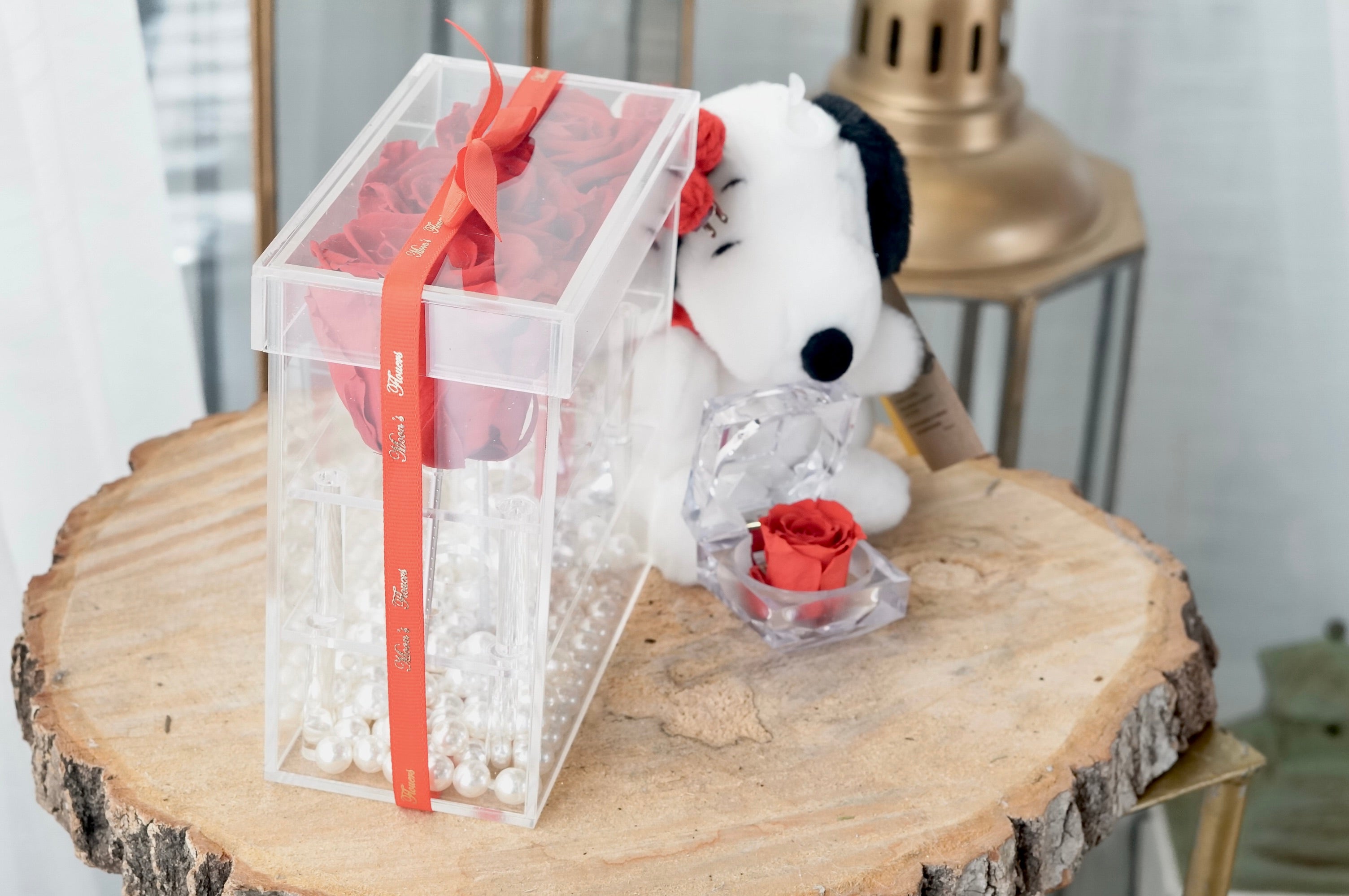 The Preserved Roses in Acrylic Box (3) is displayed alongside an add-on stuffed animal and a smaller Preserved Rose