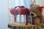 Preserved Roses in Acrylic Box 9 is seen alongside an add-on item known as Toffee Bear! Together they make the perfect joint gift for your recipient. 