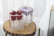 Red and Lilac Preserved Roses in Acrylic Boxes side-by-side comparing and contrasting the unique colour options.