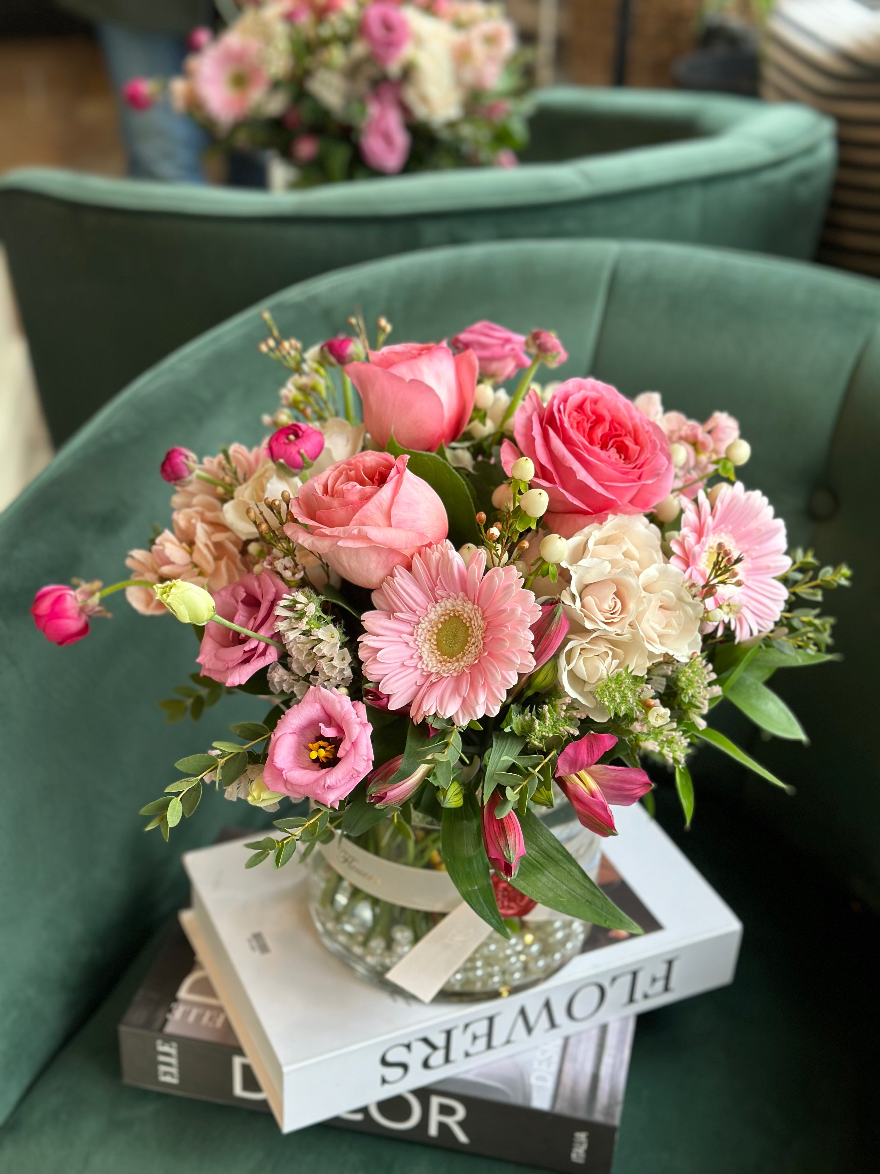 MOTHER'S DAY - Pretty Pink flower arrangement featuring pink roses, carnations, and white alstroemeria in a glass vase. Luxury floral gift for same-day delivery in Toronto by Moon's Flowers