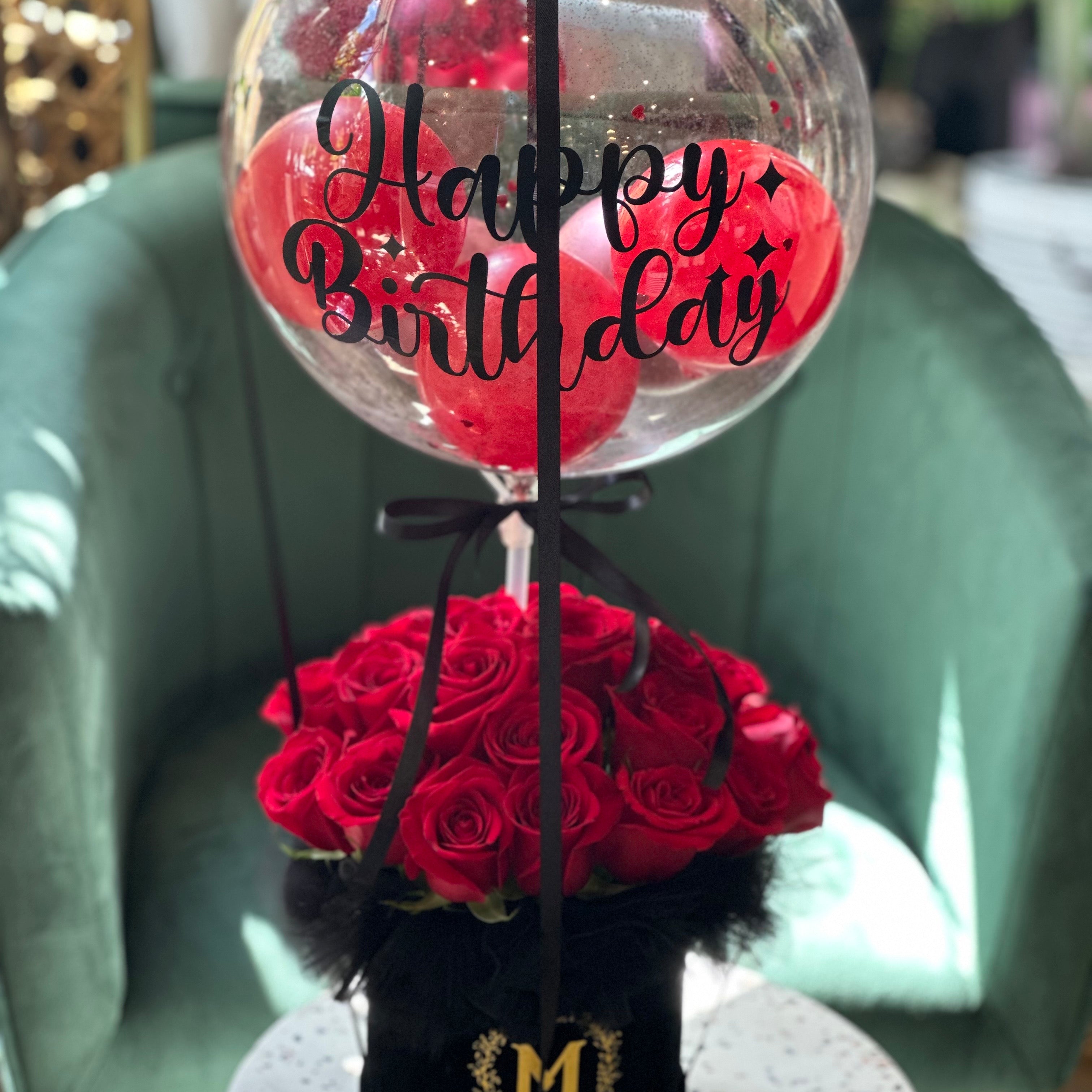 Romantic rose box arrangement with balloon add-on for a celebratory gift By Moon's flowers delivery in Toronto