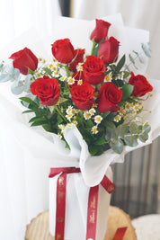 Rose in the Garden bouquet featuring dozen red roses with chamomile and fresh greenery