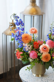Premium Mother's Day flowers from Moon's Flowers. Colorful 'Sunset Serenity' arrangement with seasonal spring blooms, professionally designed for delivery in Toronto, Oakville, and the GTA