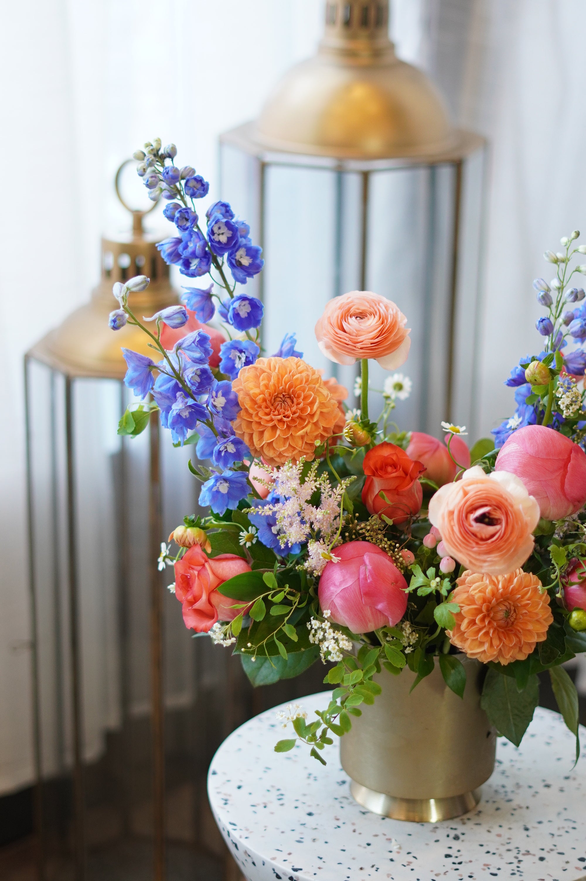 Premium Mother's Day flowers from Moon's Flowers. Colorful 'Sunset Serenity' arrangement with seasonal spring blooms, professionally designed for delivery in Toronto, Oakville, and the GTA