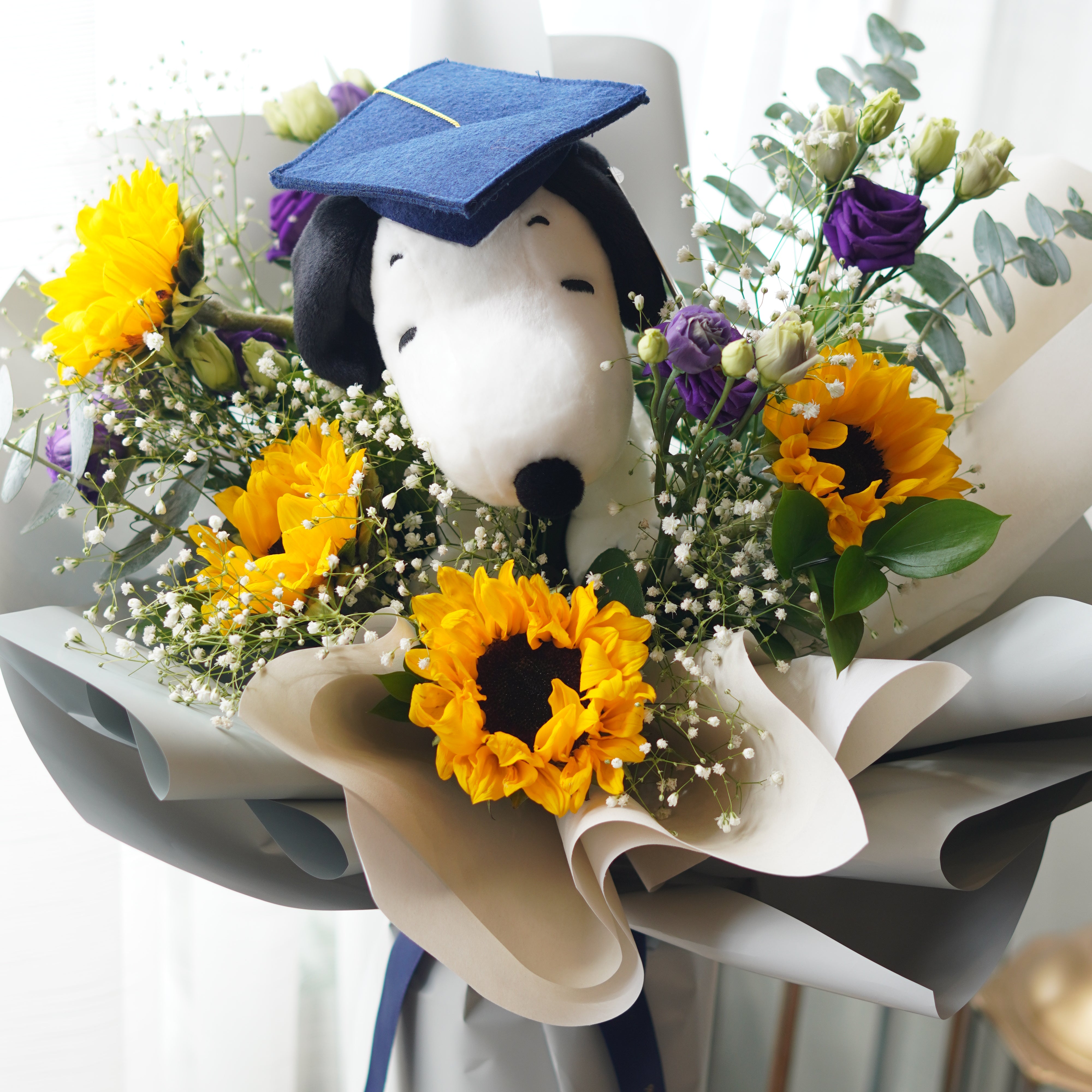 Snoopy graduation bouquet with sunflowers and purple flowers, bright graduation bouquet Toronto