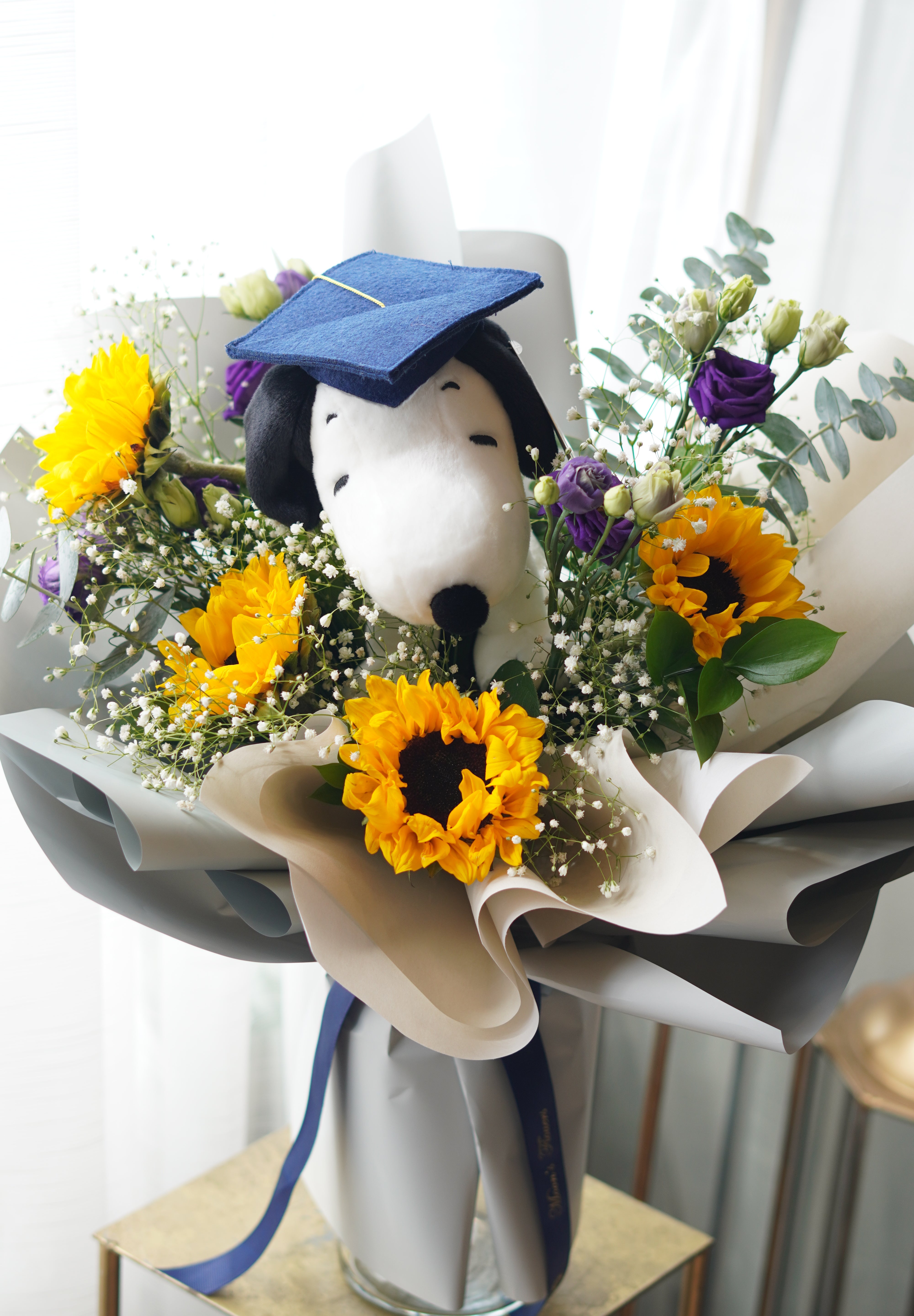 Snoopy graduation bouquet with sunflowers and purple flowers, bright graduation bouquet Toronto