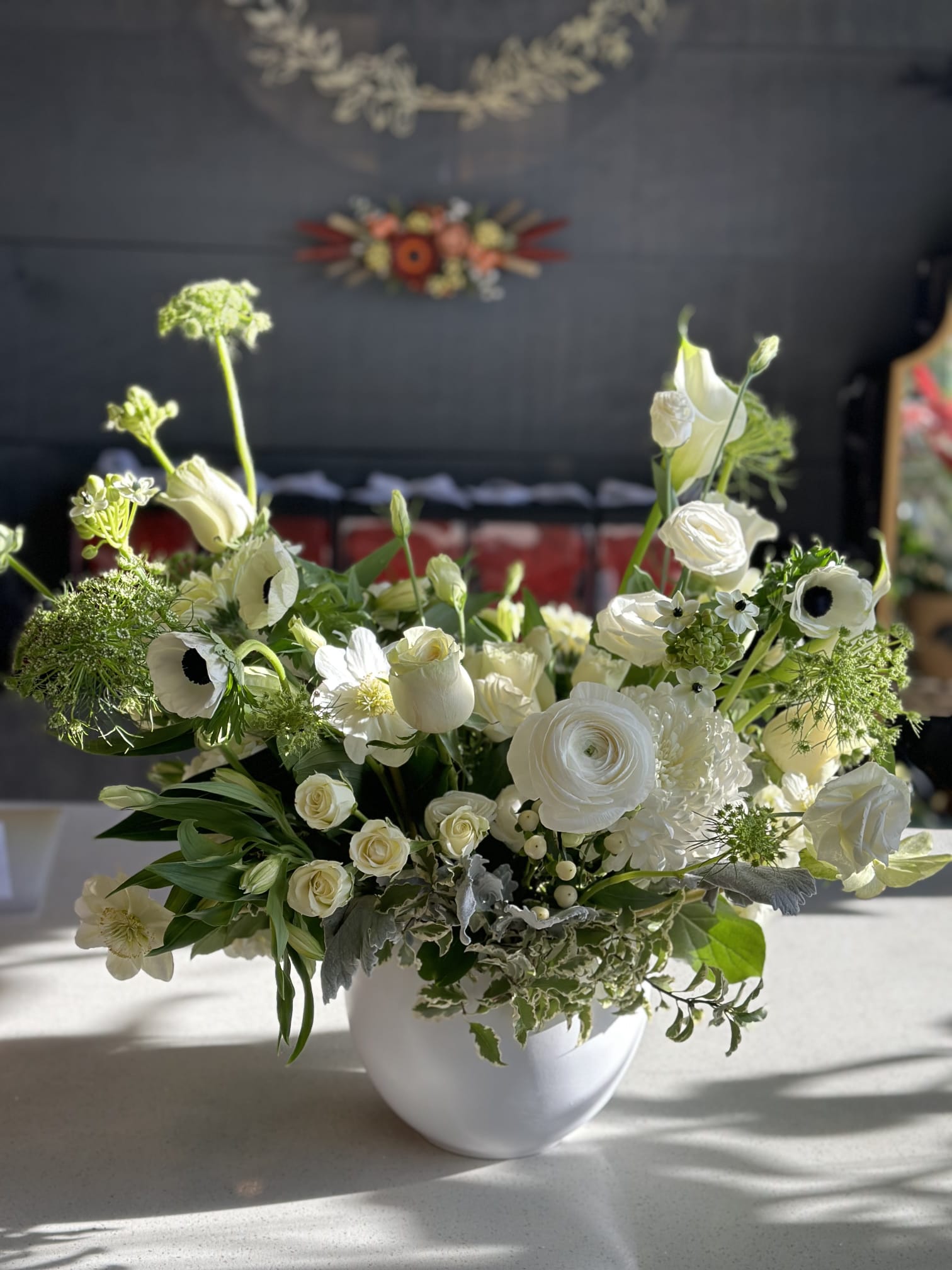 White funeral flower arrangement for home or service delivery in Oakville and Mississauga