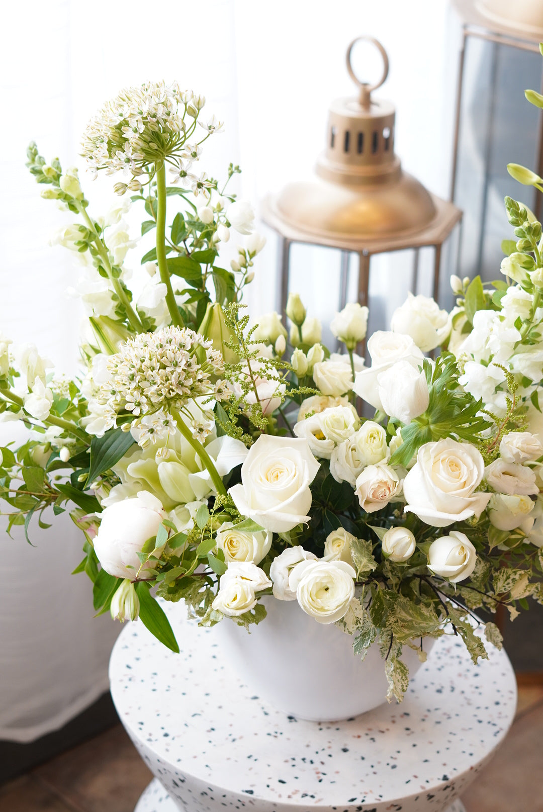 White funeral flower arrangement for home or service delivery in Oakville and Mississauga.