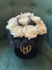 Hand- painted black edged white roses in a luxury black box with dark tulle accent by Moon's Flowers / delivery / Oakville