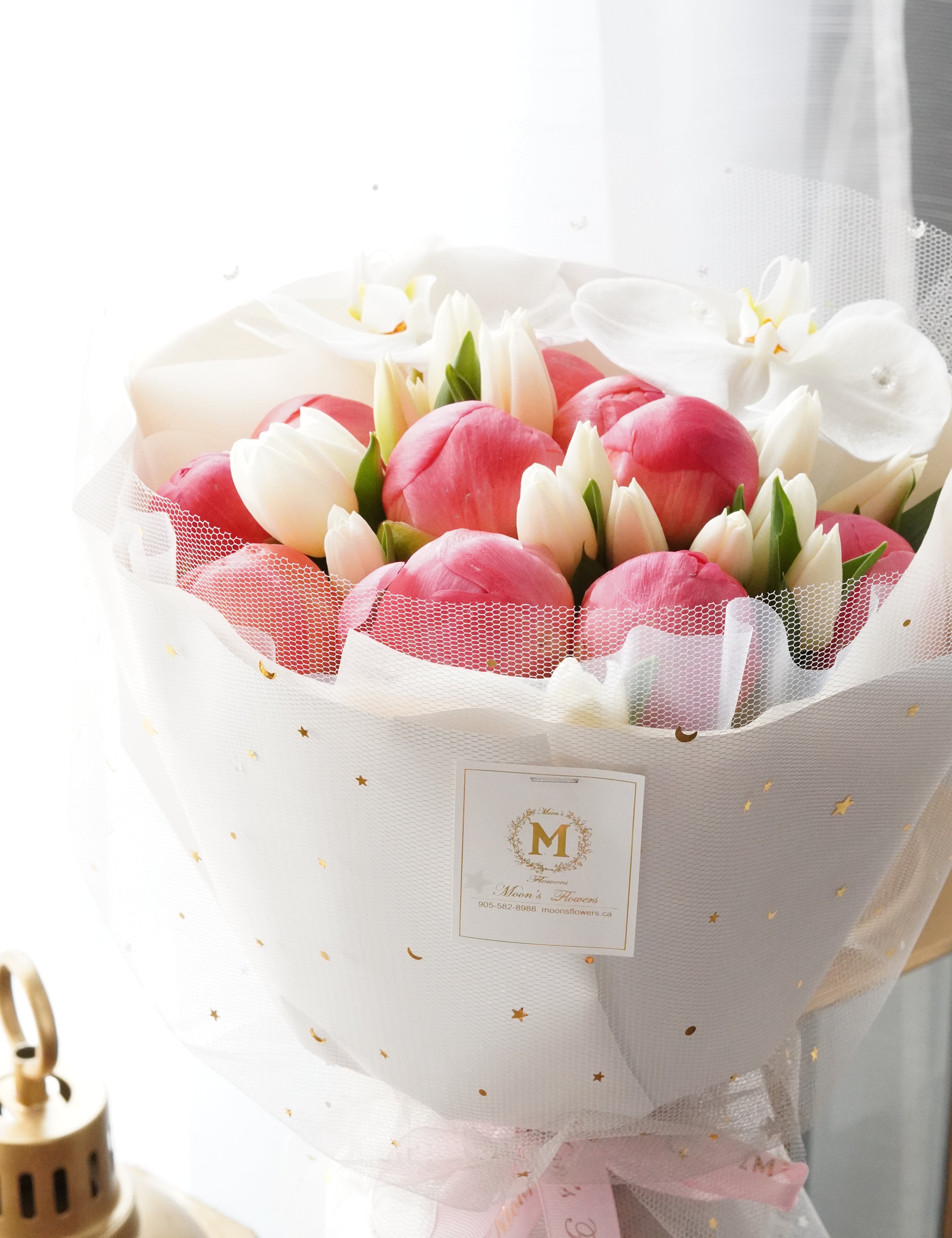 coral peony and white orchid bouquet Toronto