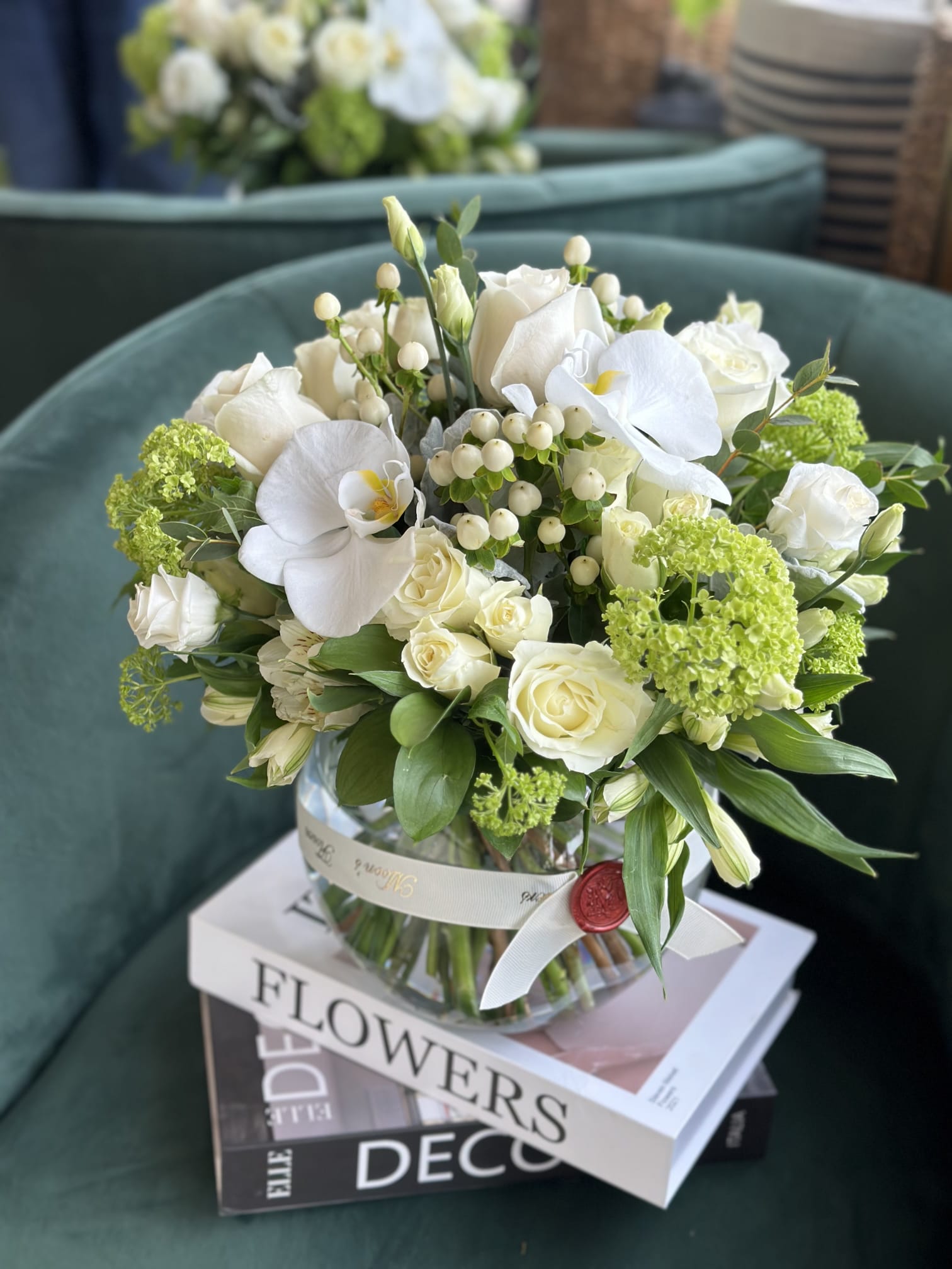 Mix White Flowers With Greenery In A Vase