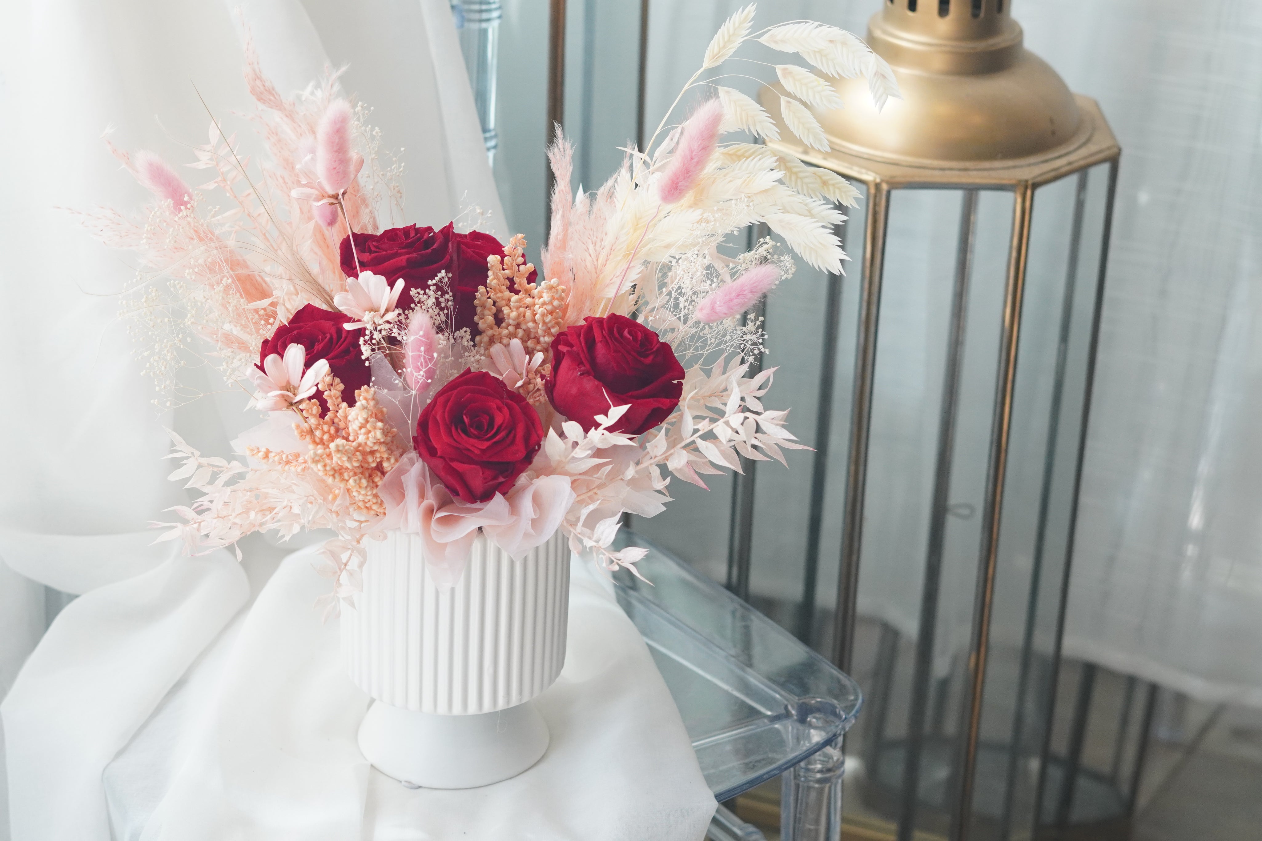 dried floral arrangement pampas bunny tails red roses