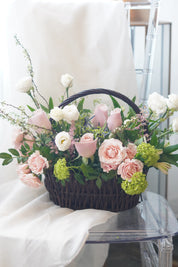 flower basket delivery Toronto with pink roses and white flowers