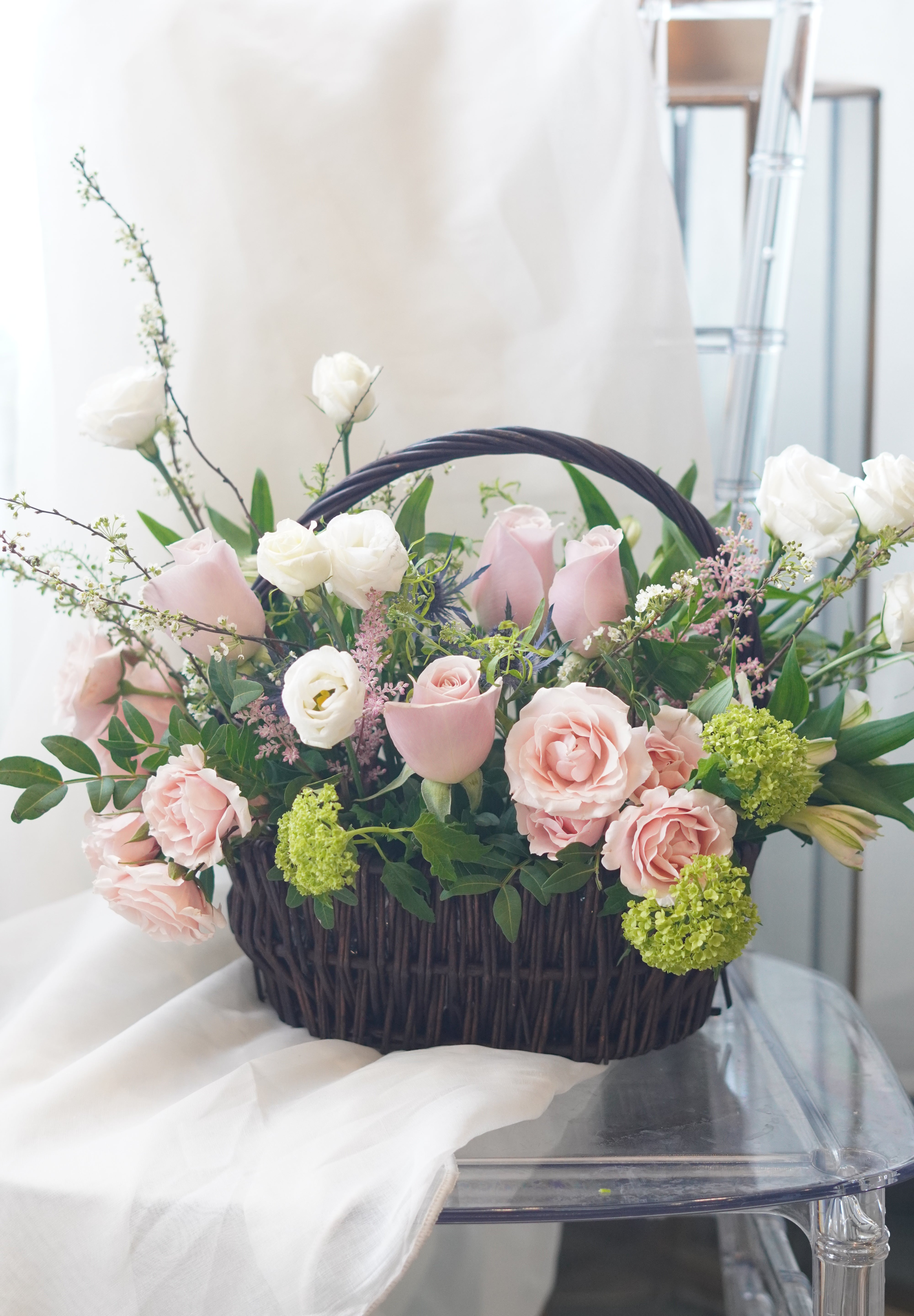 flower basket delivery Toronto with pink roses and white flowers