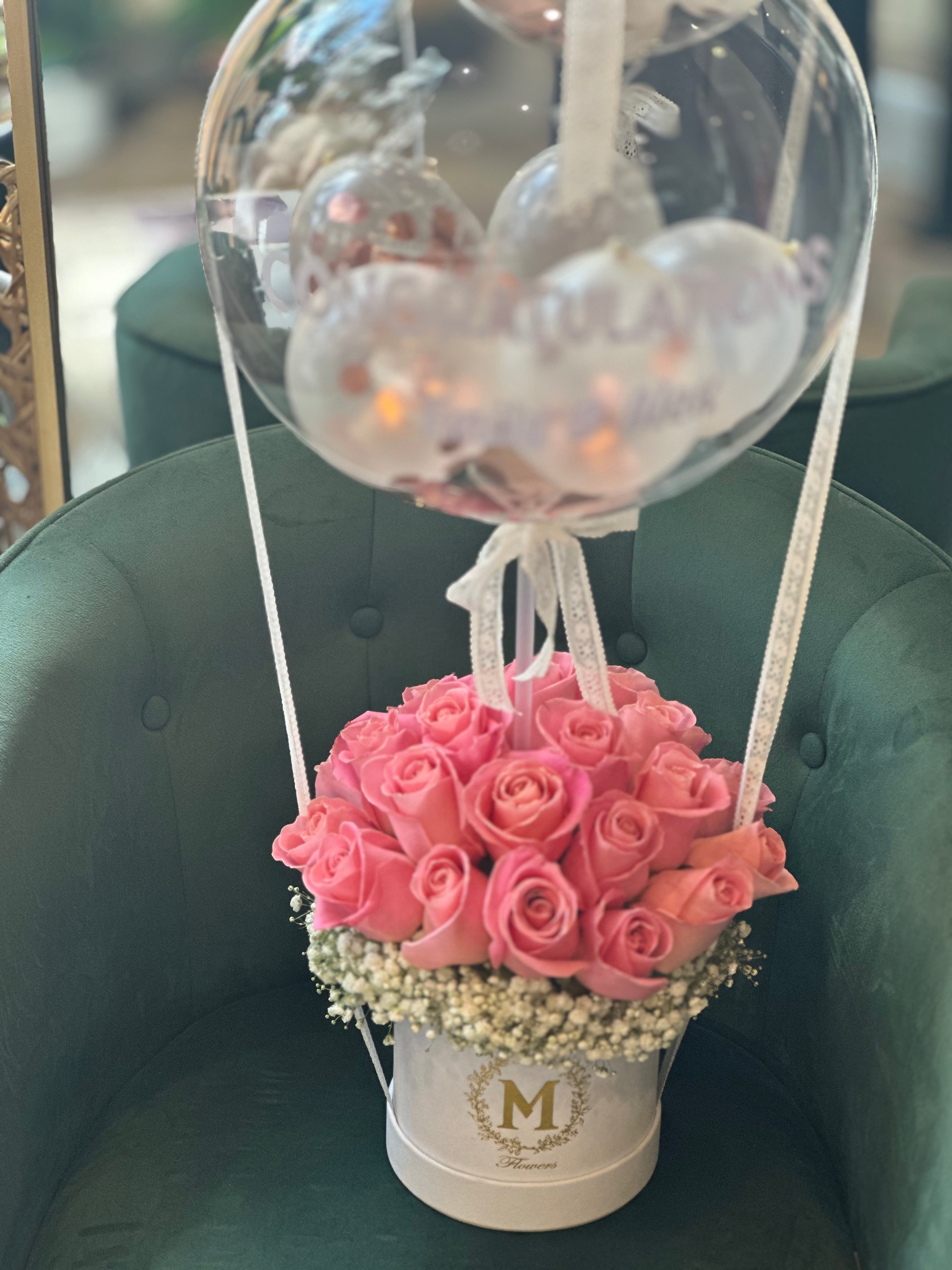 Romantic pink roses box with balloon