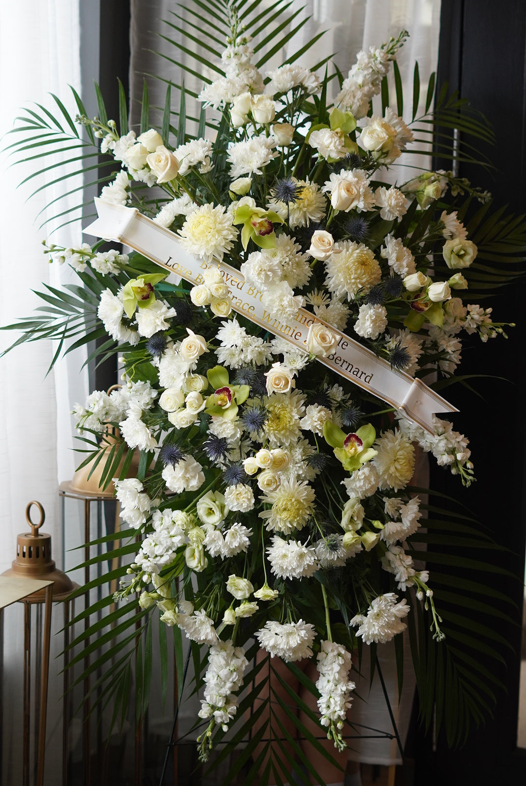 this elegant floral display conveys deep compassion and respect,Funeral and Sympathy Flowers Delivery Toronto