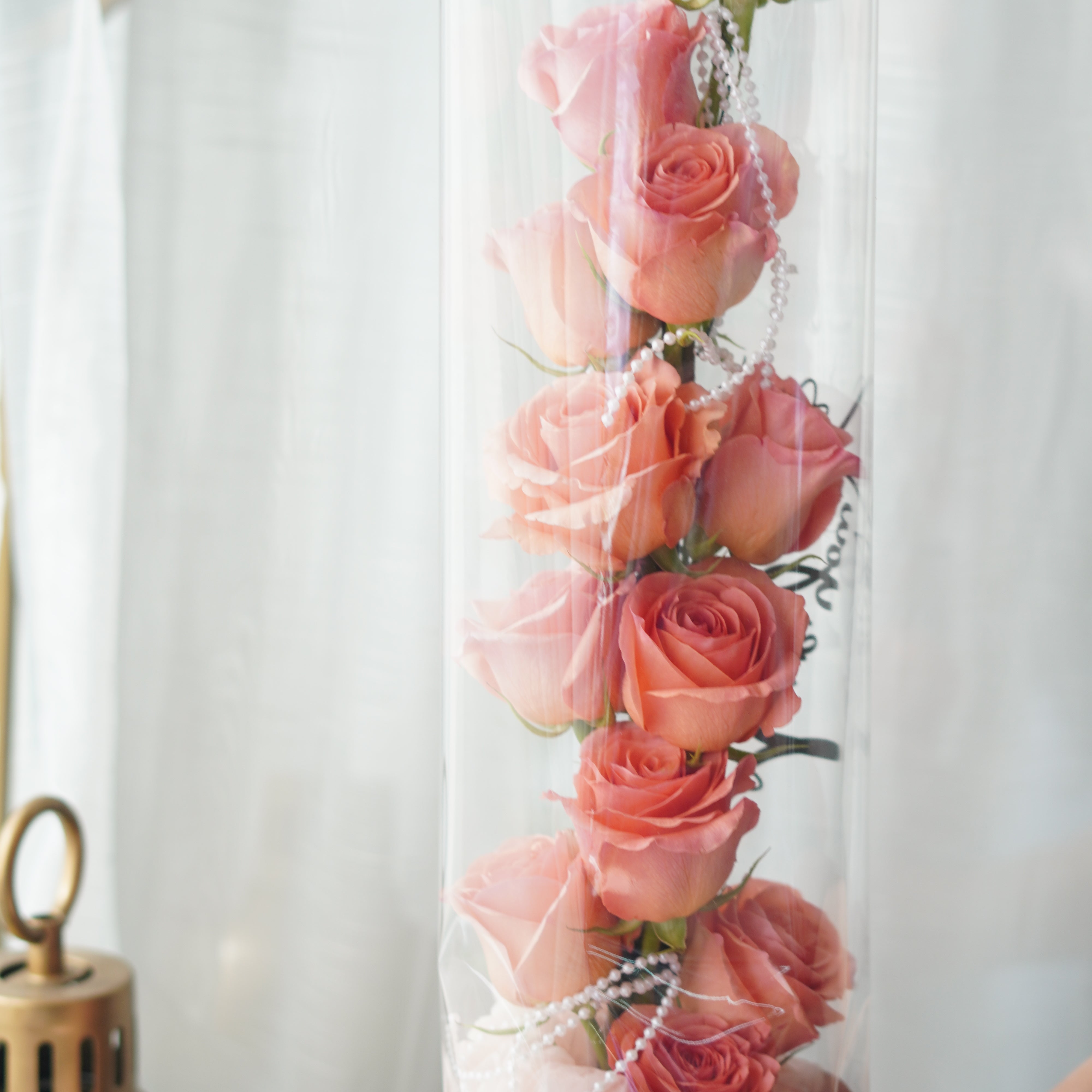 tanghulu rose bouquet full view, hand-held vertical rose bouquet with clear wrap and ribbon finish