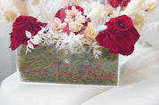 transparent flower box red roses dried florals