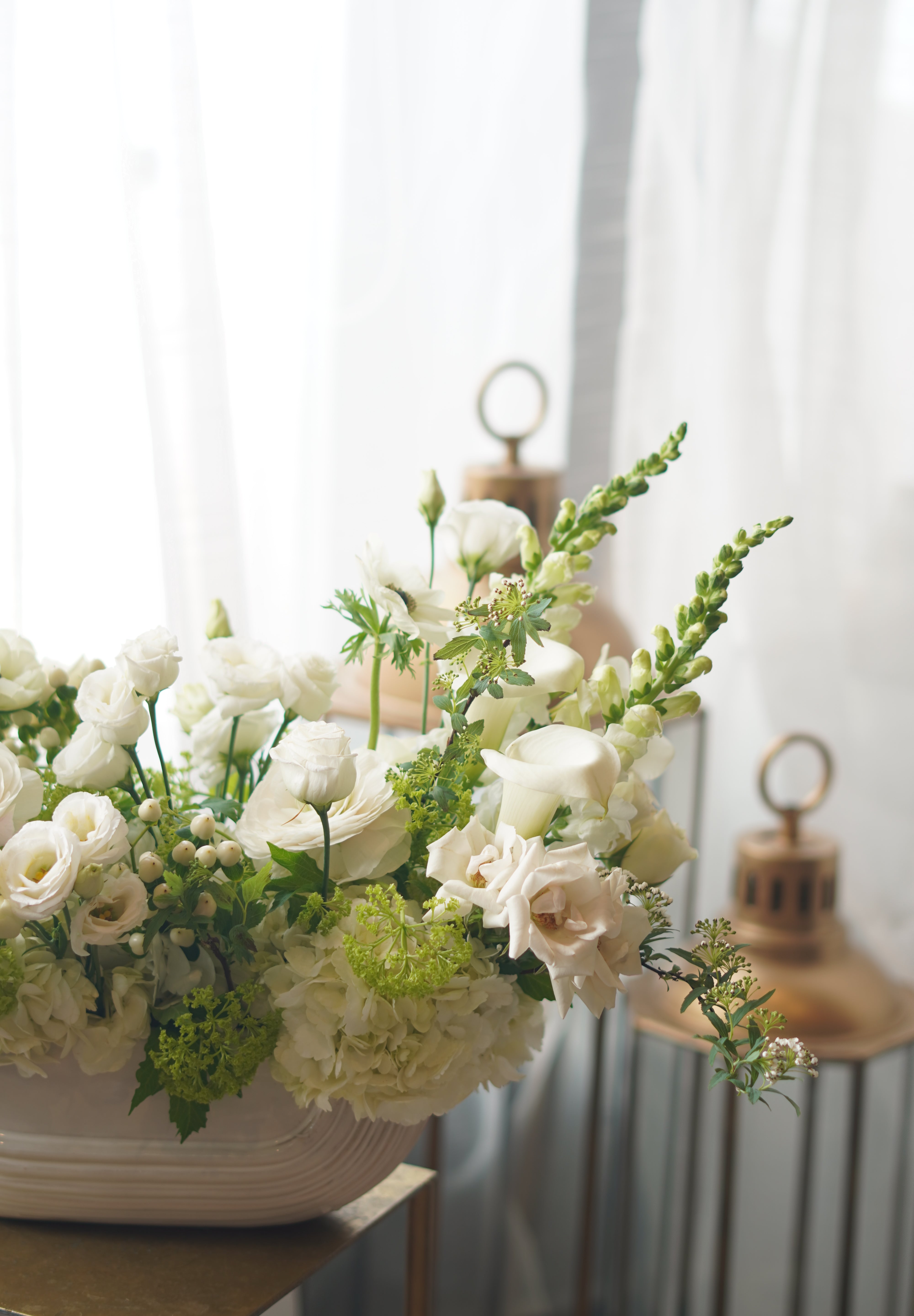 white wedding flower arrangement in ceramic vase Toronto delivery