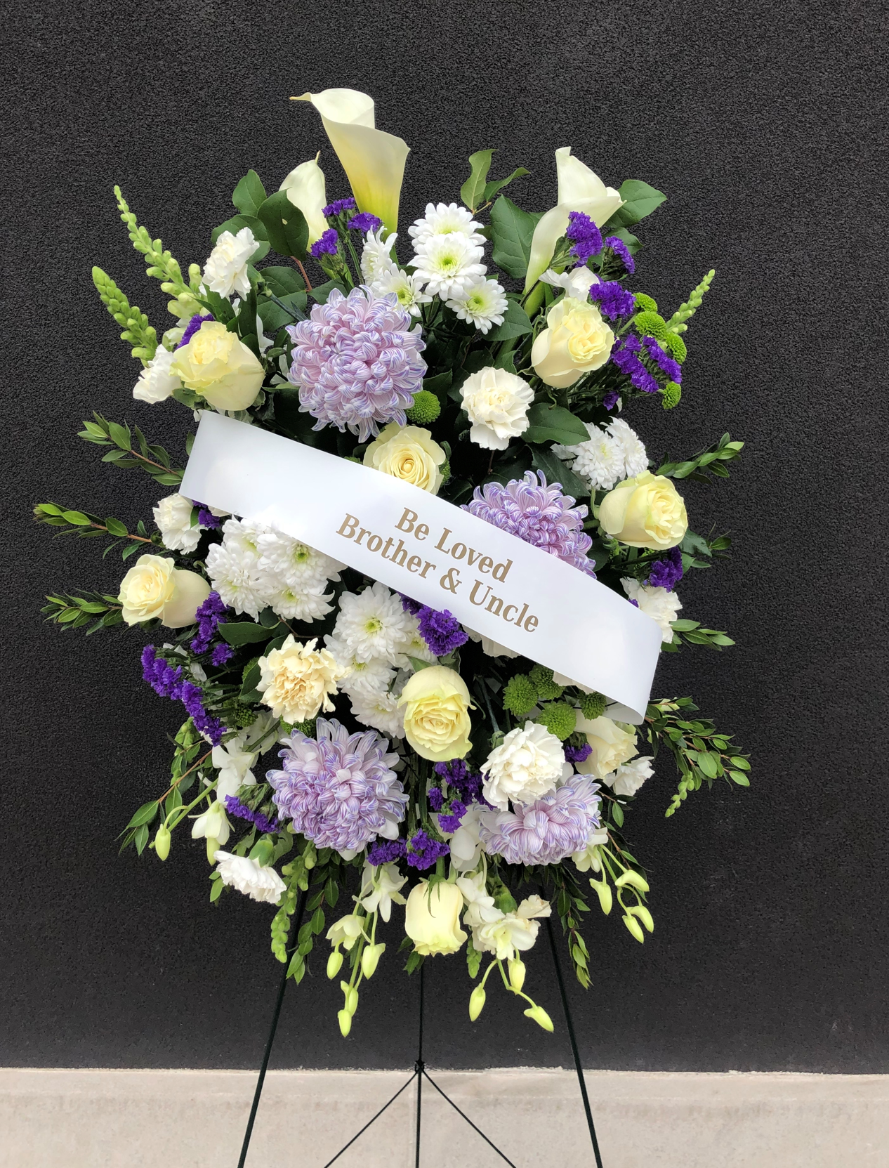 White & Purple Standing Funeral Spray