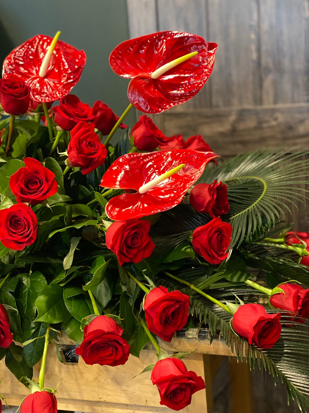 Red Condolences Casket Spray