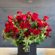 Sleek and modern arranged red roses  box, showcasing its vibrant and dramatic color