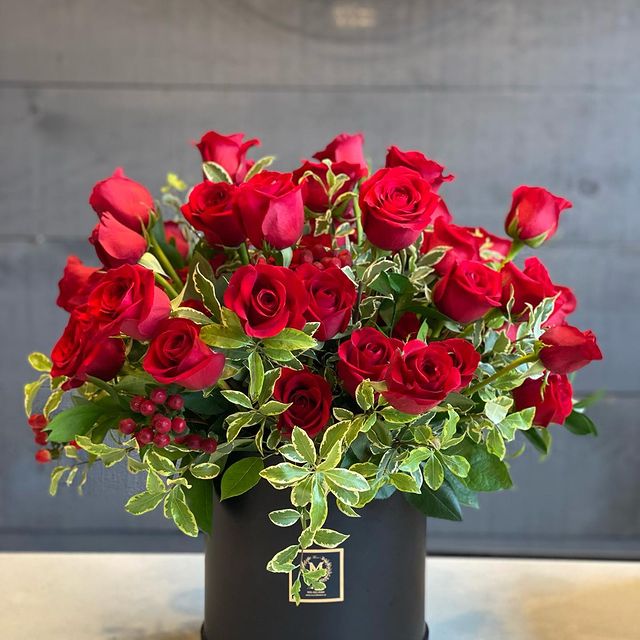 Sleek and modern arranged red roses  box, showcasing its vibrant and dramatic color
