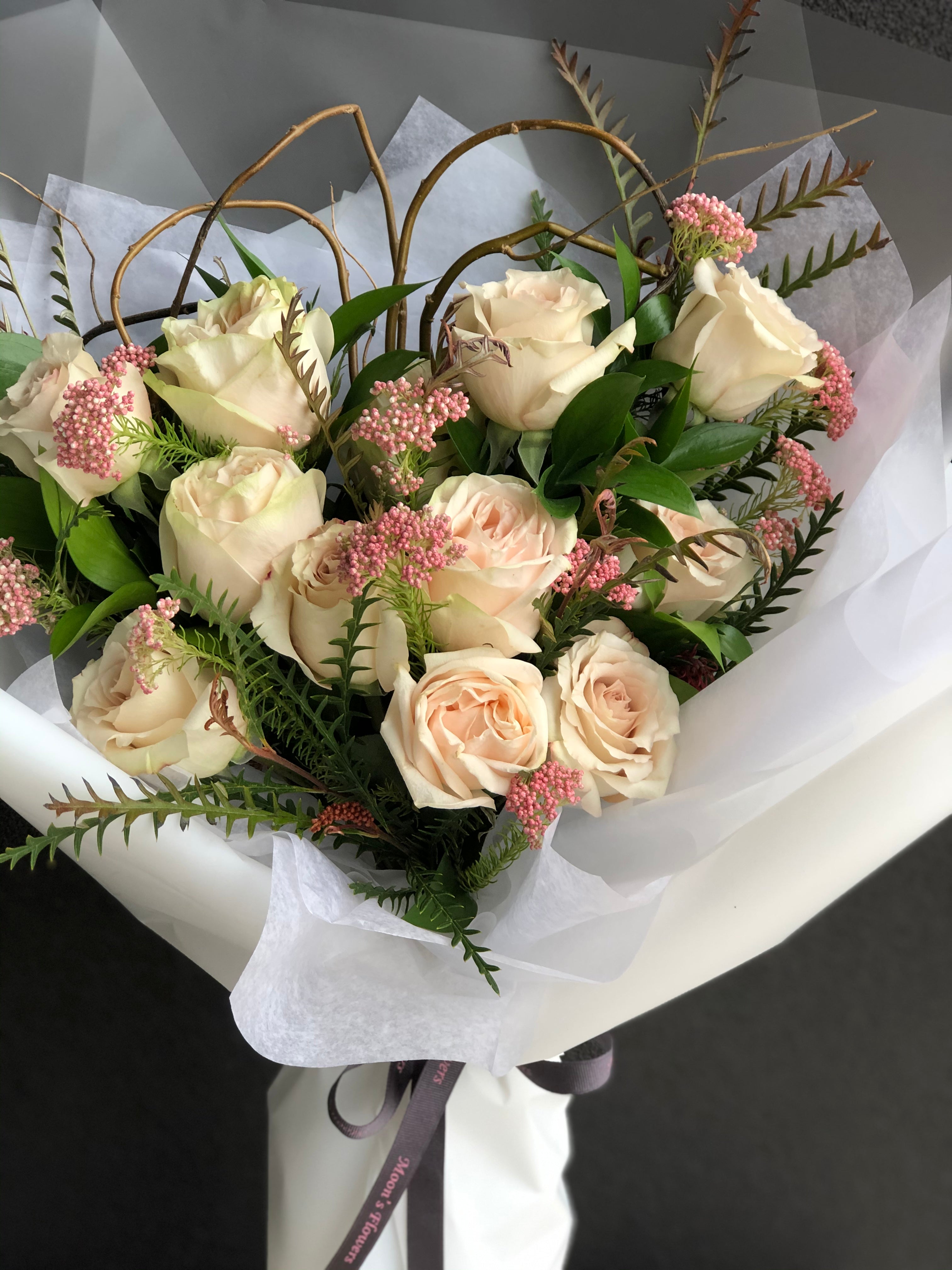 Close-up of heart-shaped pink roses highlighting soft color and petal texture