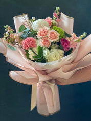 Deluxe size blush pink rose and white hydrangea bouquet wrapped in soft pink paper